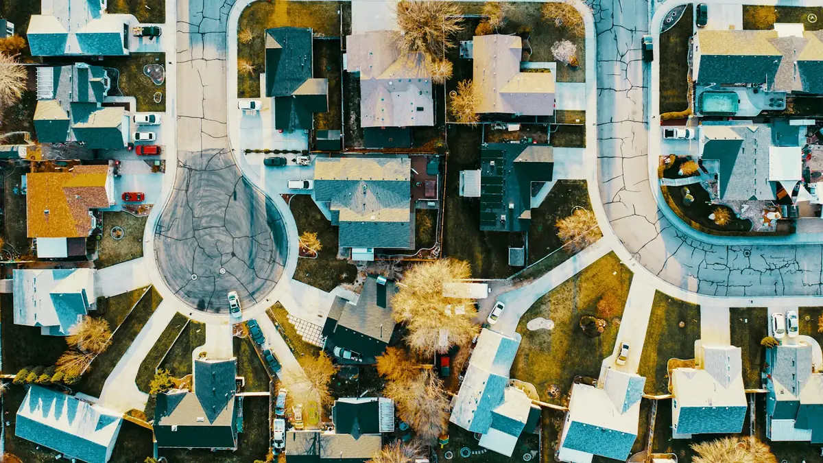 An aerial view of cul-de-sacs and rooftops in a newer subdivision - Leak Detection in Caldwell